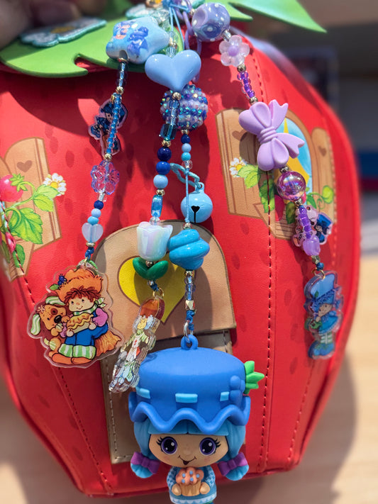 BLUEBERRY MUFFIN GIRL BAG CHARM